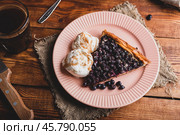 One Slice of Amelanchier Berries Galette and Two Scoops of Ice Cream. Стоковое фото, фотограф Всеволод Белоусов / Фотобанк Лори