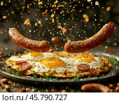 Fried Egg Day is a fun and unusual holiday celebrated in different parts of the world on March 18 every year. This day is dedicated to fried eggs - one of the most popular and favorite dishes in the world. Стоковое AI-изображение, AI-художник Сергей Елизарьев / Фотобанк Лори