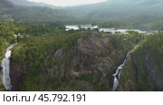Latefossen is one of the most visited waterfalls in Norway and is located near Skare and Odda in the region Hordaland, Norway. Consists of two separate streams flowing down from the lake Lotevatnet. (2019 год). Стоковое видео, видеограф Андрей Армягов / Фотобанк Лори