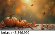 Three pumpkins are on a wooden table with leaves. Стоковое AI-видео, аниматор Sergey Grishin / Фотобанк Лори