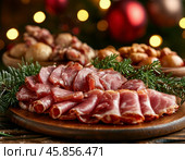 Meat balyk on the New Year's table. Balyk is a piece of meat without bones, tendons and fat, regardless of the type of meat, it can be pork, beef and even horse meat, subjected to salting and heat treatment. Стоковое AI-изображение, AI-художник Сергей Елизарьев / Фотобанк Лори