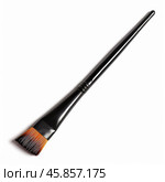 Foundation brush angled flat synthetic bristles makeup tool beauty product on white background. Стоковое AI-изображение, AI-художник Иван Рябоконь / Фотобанк Лори