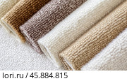 Boucle Fabric samples in various neutral colors close up arranged, texture detail, interior design palette background. Стоковое AI-изображение, AI-художник Анастасия Золотницкая / Фотобанк Лори