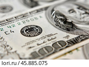 Close up of one hundred dollar bill showing seal and portrait of benjamin franklin. Стоковое AI-изображение, AI-художник Иван Рябоконь / Фотобанк Лори