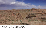 Rock formations and stacked stones in Mongolia. Стоковое видео, видеограф Михаил Коханчиков / Фотобанк Лори