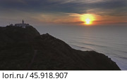 Lighthouse at Cape Roca at sunset, Portugal (2019 год). Стоковое видео, видеограф Михаил Коханчиков / Фотобанк Лори