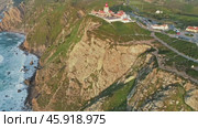 Aerial view of lighthouse at Cape Roca in Portugal (2019 год). Стоковое видео, видеограф Михаил Коханчиков / Фотобанк Лори