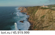 Aerial view of lighthouse at Cape Roca in Portugal (2019 год). Стоковое видео, видеограф Михаил Коханчиков / Фотобанк Лори