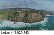 Aerial view of lighthouse at Cape Roca in Portugal (2019 год). Стоковое видео, видеограф Михаил Коханчиков / Фотобанк Лори
