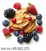 Creamy peanut butter surrounded by fresh berries and redcurrants on white background. Стоковое AI-изображение, AI-художник Иван Рябоконь / Фотобанк Лори