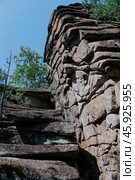 Syenite rocks igneous mountain formation. cooled layers of magma. Tourist attraction and Climbing training area. Стоковое фото, фотограф Екатерина Якименко / Фотобанк Лори