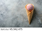 Sweet dessert. Ice cream cones with different flavors on a concrete gray background. World Ice Cream Day. Стоковое AI-изображение, AI-художник Photojuli / Фотобанк Лори