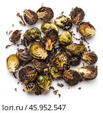 Roasted brussel sprouts halves on white background. Стоковое AI-изображение, AI-художник Иван Рябоконь / Фотобанк Лори