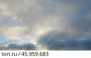 Observe dynamic flow of clouds against a vibrant blue sky, real time capture. Experience gradual shifts in skyscape during different moments in the day. Weather forecast. Climate change. Slow motion. Стоковое видео, видеограф Юлия Петровская / Фотобанк Лори