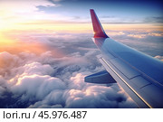 Airplane wing flying above clouds during golden hour sunset. Стоковое AI-изображение, AI-художник Иван Рябоконь / Фотобанк Лори