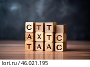 Wooden cubes showing abbreviation of consumption tax, transaction tax and added tax on reflective table. Стоковое AI-изображение, AI-художник Иван Рябоконь / Фотобанк Лори