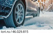Icy car. Ice-covered vehicle. Frozen Auto Covering by Snow. Vehicle during Snowstorm. Hazardous Winter Road Driving. Cold Season. Corrosion, Rust. Close-up of tires. Trail of tread marks in thick snow. Стоковое AI-видео, аниматор Марина Демидюк / Фотобанк Лори
