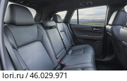 Stylish Interior of SUV, Luxury Seating. Elegant large powerful sports SUV, premium quality gray leather seats. Car rear seats. New modern car inside. Lease, rental car, sell, buy. Loan credit. Стоковое AI-видео, аниматор Марина Демидюк / Фотобанк Лори