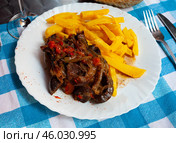Lamb osso bucco with potatoes and vegetables on white plate. Стоковое фото, фотограф Яков Филимонов / Фотобанк Лори