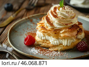 Delicious mille feuille pastry decorated with whipped cream and berries on elegant plate. Стоковое AI-изображение, AI-художник Иван Рябоконь / Фотобанк Лори