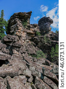 Tourist attraction and Climbing training area. Syenite rocks igneous mountain formation. cooled layers of magma. Стоковое фото, фотограф Екатерина Якименко / Фотобанк Лори