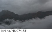 Таймлапс над облаками в горах. Стоковое видео, видеограф Сармат Батагов / Фотобанк Лори