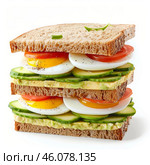 Delicious multilayered sandwich with avocado, eggs, and vegetables on whole wheat bread. Стоковое AI-изображение, AI-художник Иван Рябоконь / Фотобанк Лори
