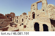 Ruins of ancient Berber fortified Ksar Beni Barka located in Tataouine Governorate in southern Tunisia with stone remains of dwelling and storing rooms. Стоковое видео, видеограф Яков Филимонов / Фотобанк Лори