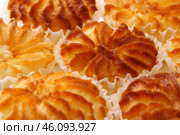 Deliciously baked pastry shells arranged on a platter with intricate designs showcasing golden crusts. Стоковое фото, фотограф Сергей Толмачёв / Фотобанк Лори