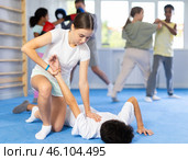Girl practicing painful armlock in sparring with boy at self defence training. Стоковое фото, фотограф Яков Филимонов / Фотобанк Лори