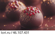 Food footage, shimmering ruby pomegranate and dark chocolate truffles dusted with edible gold glitter. Стоковое AI-видео, аниматор Ирина Михайличенко / Фотобанк Лори