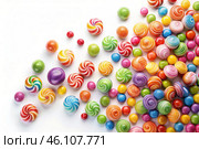 Colorful dragee candies in the assortment on a white background. Various sweets, confectionery and dragees of different shapes and colors. Bright rainbow hues. Стоковое AI-изображение, AI-художник Photojuli / Фотобанк Лори