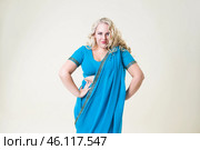 Plus size fashion model, fat woman on beige background, overweight female body. Стоковое фото, фотограф Станислав Тарко / Фотобанк Лори