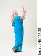 Plus size fashion model, fat woman on beige background, overweight female body. Стоковое фото, фотограф Станислав Тарко / Фотобанк Лори