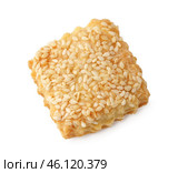 Baked sesame snack with crunchy texture and golden color on a white background. Стоковое фото, фотограф Сергей Толмачёв / Фотобанк Лори