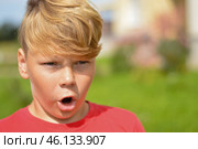Little cute blue eyed boy is looking with wide opened eyes surprisingly shocked - children real emotions. Стоковое фото, фотограф Ирина Старикова / Фотобанк Лори