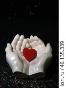 In the palms of white hands there is a red heart. Стоковое фото, фотограф Boris Vasilenko / Фотобанк Лори