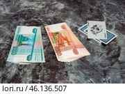 Колода карт деньги рубли пачка купюры 5000 рублей 1000 рублей джокер deck of cards banknotes rubles joker. Стоковое фото, фотограф Константин Козлов / Фотобанк Лори