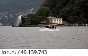 Взлет самолета на водных лыжах на озере Комо. Италия. Май. Jet ski plane taking off on Lake Como. Italy. May. Редакционное видео, видеограф Горшков Александр / Фотобанк Лори