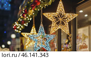City streets advent Christmas decorations by night. Festive Xmas decor, colorful ornaments in urban setting. Holiday decorations of building or shops glow brightly, shiny stars. Illuminated ornaments. Стоковое AI-видео, аниматор Марина Демидюк / Фотобанк Лори