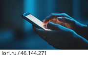 Point finger on screen phone closeup, person testing test message, touch blue screen on smartphone. Night Bokeh Light. Close-UP. Person using in hands mobile phone close up in the dark. Online wi-fi. Стоковое AI-видео, аниматор Марина Демидюк / Фотобанк Лори
