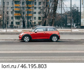 Red color car Mini Cooper parked on street. Редакционное фото, фотограф Константин Григорьев / Фотобанк Лори
