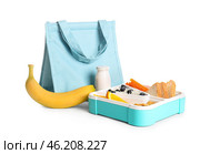 Lunch bag and lunchbox with delicious food isolated on white background. Стоковое фото, фотограф Pixel_shot / Фотобанк Лори