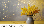 A beautiful fluffy bouquet of mimosa on a gray background. Close-up. The idea of spring and International Women's Day on March 8th. Стоковое AI-изображение, AI-художник Photojuli / Фотобанк Лори