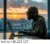 Человек в противогазе сидит за ноутбуком. Стоковое AI-изображение, AI-художник Руслан Лесков / Фотобанк Лори