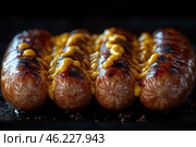 Close-up of grilled sausages with an appetizing crust. On top of them, yellow processed cheese is evenly distributed, slightly spread and caramelized, creating the effect of juiciness and piquancy. The sausages have a glossy shine due to the natural juice and oil released during the cooking process. The dark background emphasizes the rich colors of the dish, making it even more appetizing. Стоковое AI-изображение, AI-художник Анна Кривицкая / Фотобанк Лори