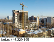 Строительство жилого комплекса Титул в Воронеже, 2025 год. Стоковое фото, фотограф Наталья Романюк / Фотобанк Лори