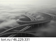 A complex multi-level road junction passing through thick fog. High overpasses curve, forming smooth lines, creating the effect of an endless labyrinth. Cars move along the highway, getting lost in the foggy haze, which gives the scene a mystical and futuristic atmosphere. City buildings and skyscrapers are barely visible through thick clouds, enhancing the feeling of the road being detached from the ground. Стоковое AI-изображение, AI-художник Анна Кривицкая / Фотобанк Лори