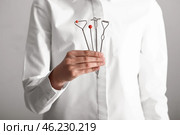 Speech therapist with logopedic probes, closeup. Стоковое фото, фотограф Pixel_shot / Фотобанк Лори