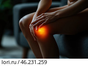 Knee pain, joint inflammation, arthritis and degenerative changes, woman suffering from leg ache and doing self-massage. Стоковое AI-изображение, AI-художник Станислав Тарко / Фотобанк Лори